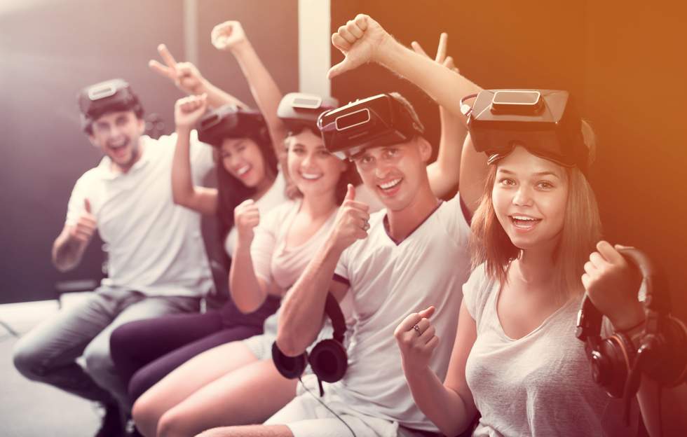 5 young people enjoying virtual reality games School Holiday Activities