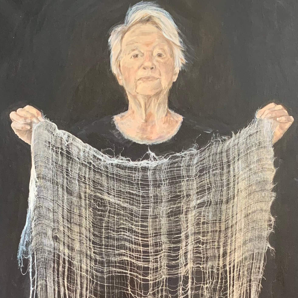 A woman holding fabric