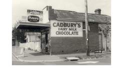 old black and white photo of grocery shop