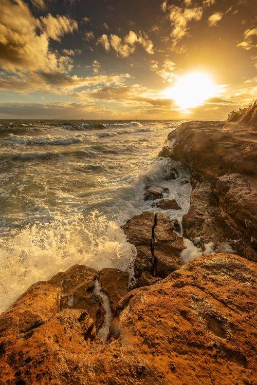 Rocks and sea at sunset