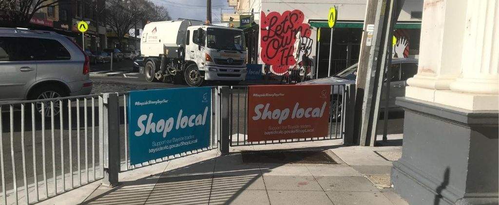 Shop local signs in Brighton.