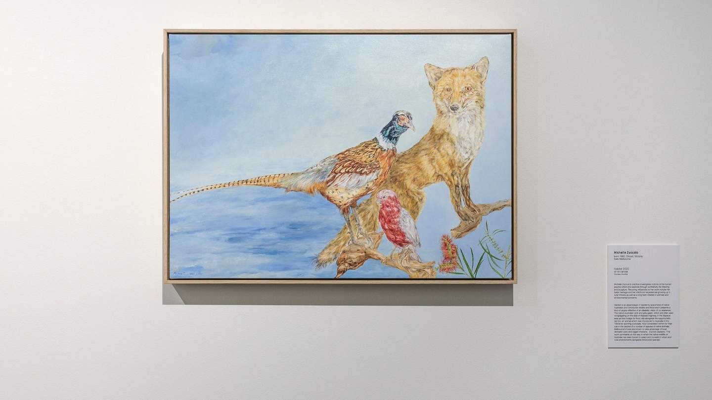 Painting of a fox and pheasant hanging in gallery