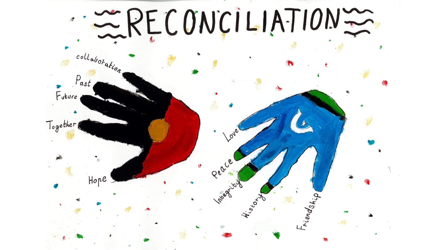 A painting of two hands with the word reconciliation 