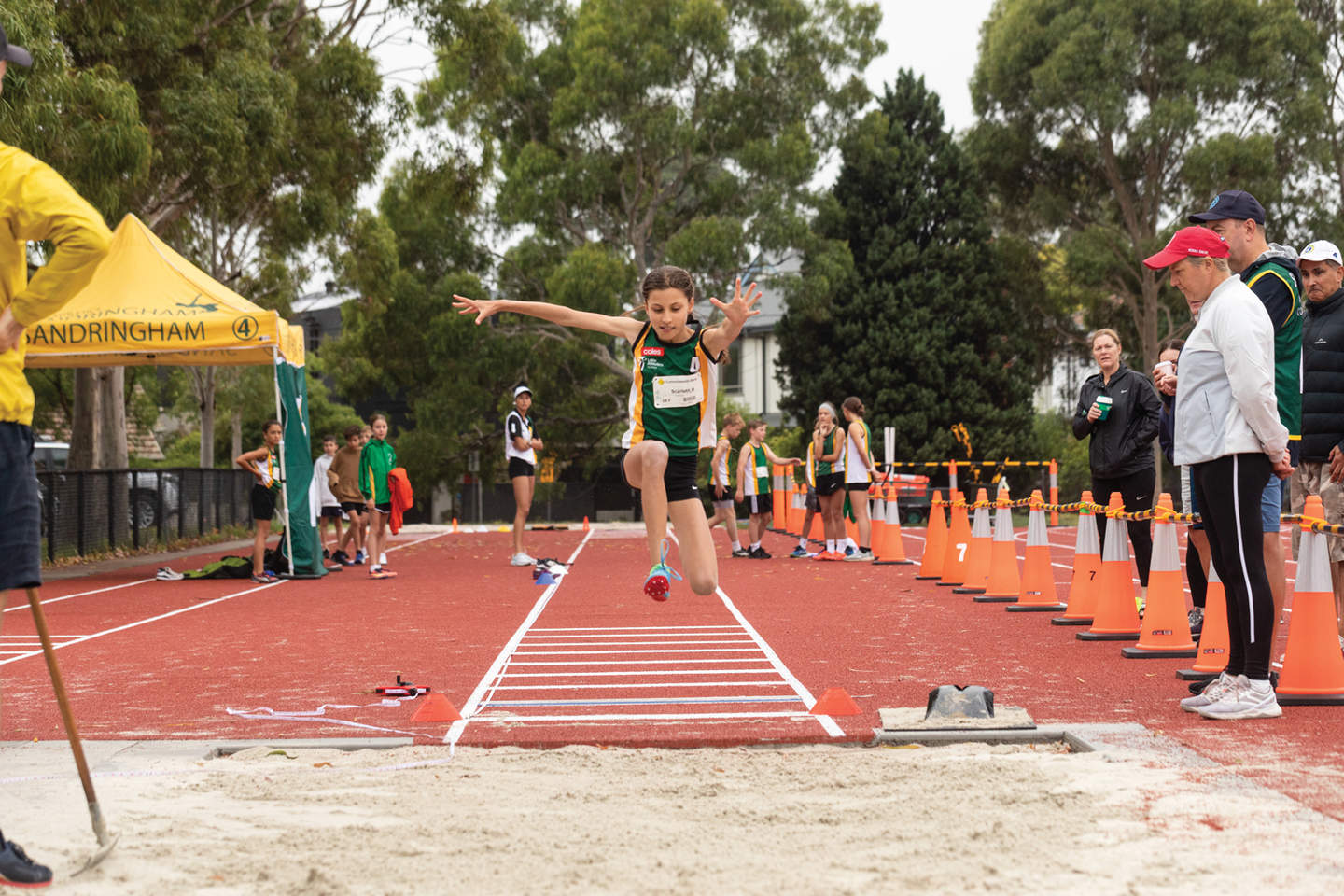 Athlete mid air of a long jump