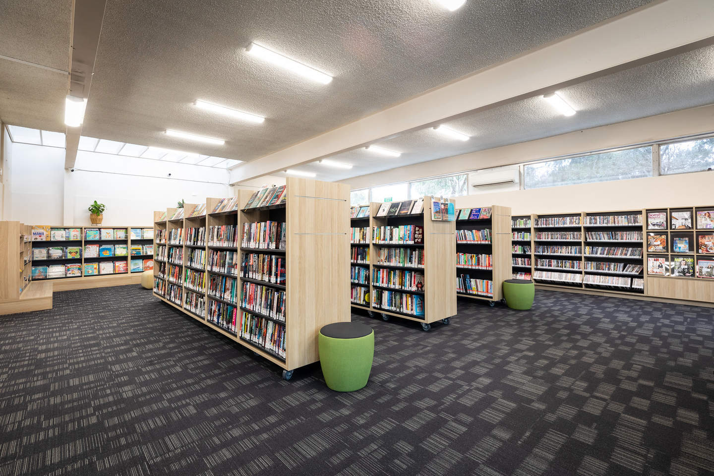 Hampton library interior with wooden book shelves 