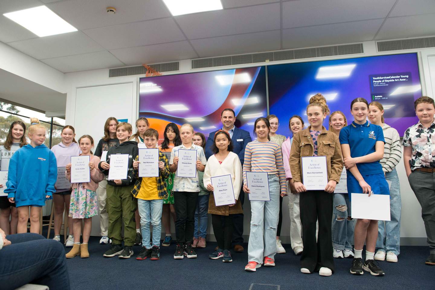 Group of 10 to 13 year olds holding certificates, pictured with the Mayor of Bayside. Young People of Bayside Art Awards 2023. 