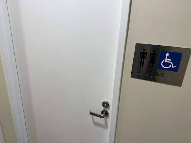 Accessible toilet located inside the council building.
