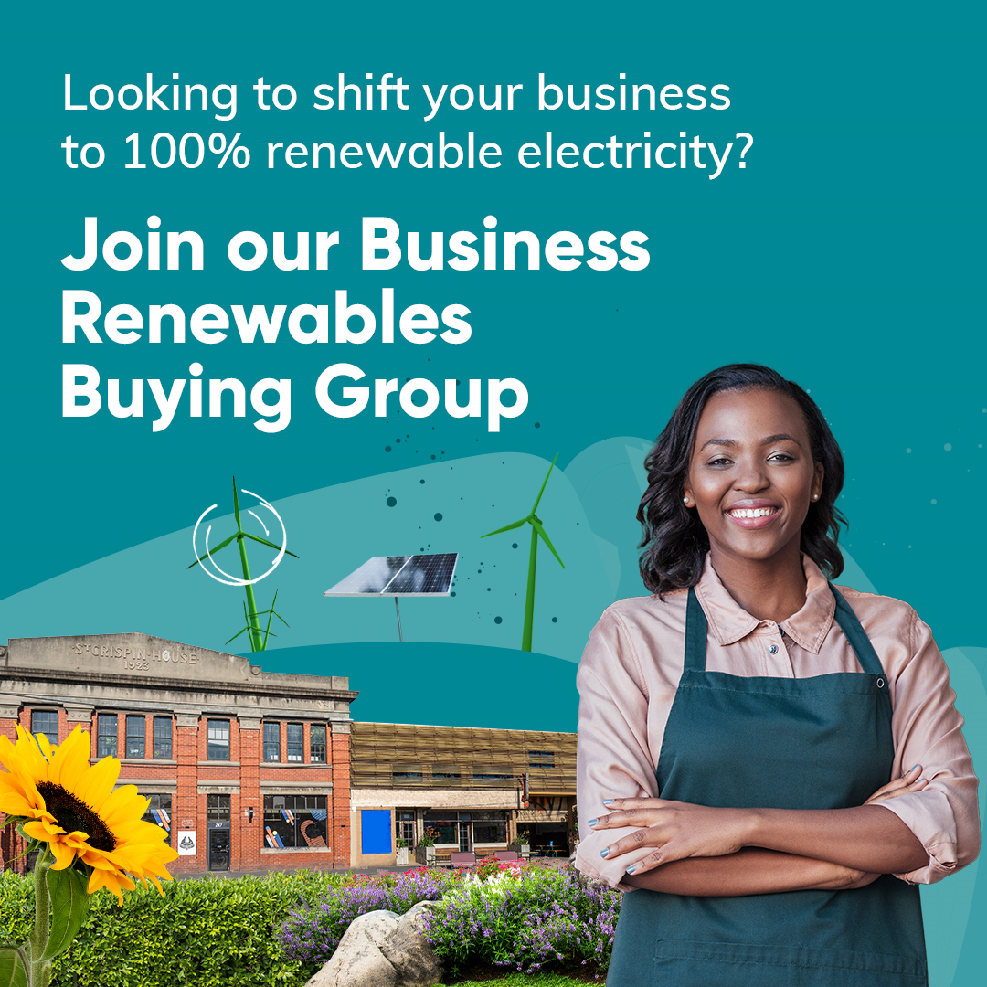 "Looking to shift your business to 100% renewable energy? Join our Business Renewables Buying Group". A smiling lady in an apron stands in front of a business and garden. 