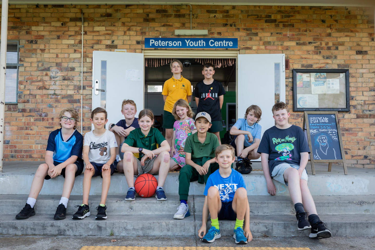 Group of children in front of Peterson Youth Cnetre