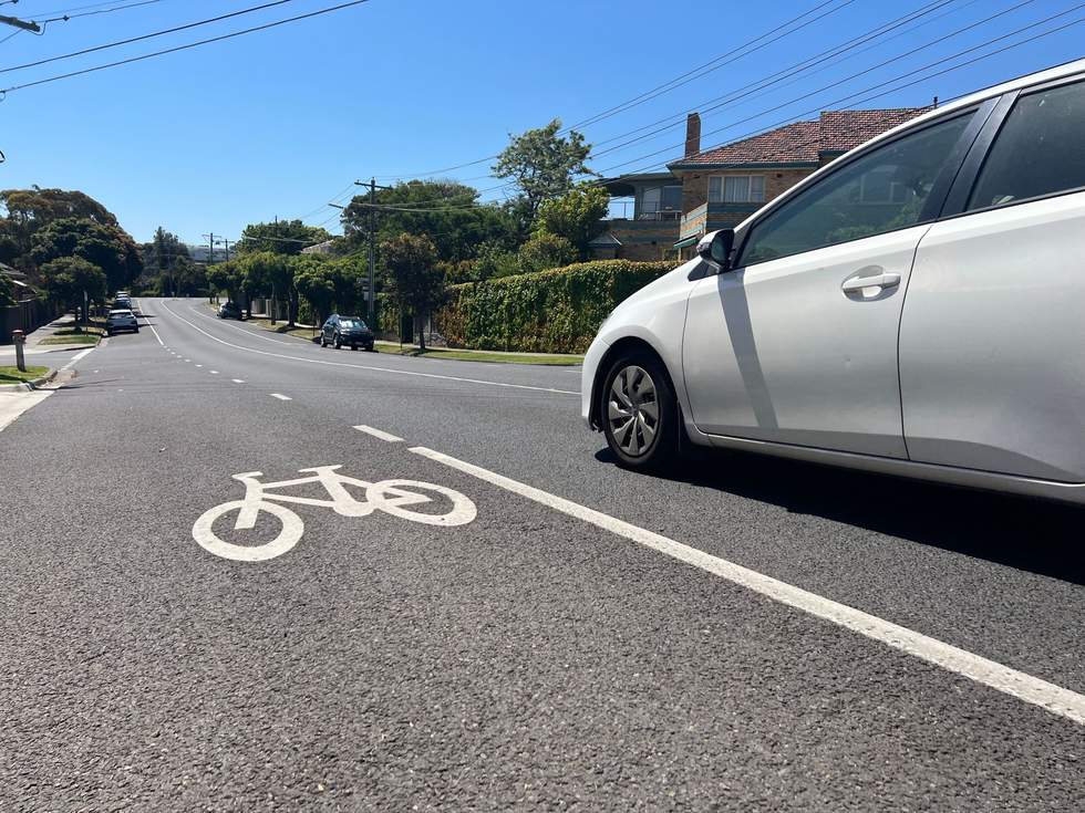Fernhill Road bike lane and passing car