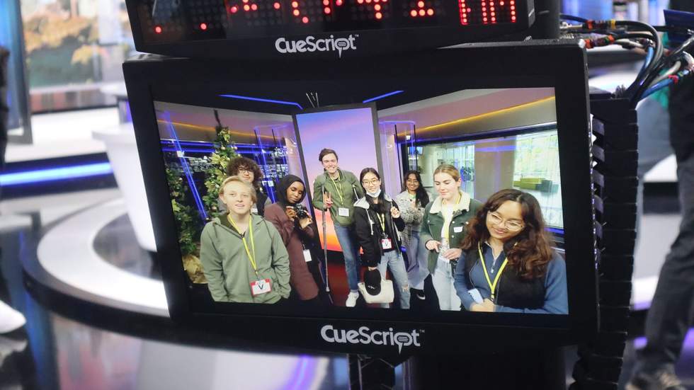 Nine students on a Tv screen in the ABC studios.