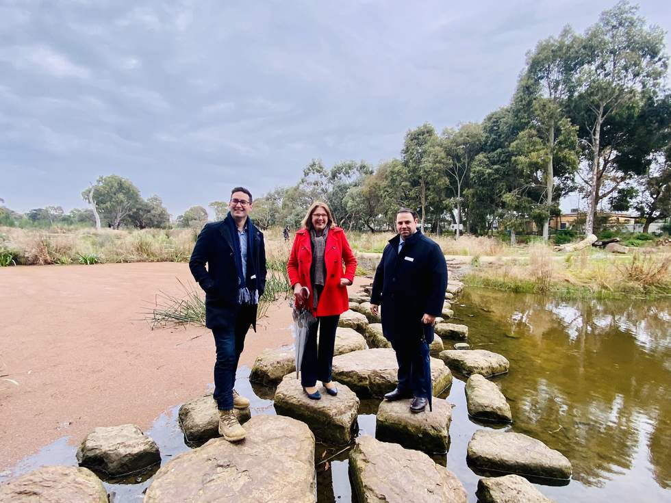 Federal Member Josh Burns MP, Federal Minister Hon Catherine King MP and Bayside Mayor, Cr Hanna El Mouallem standing on the rocks in Yalukit Willam Reserve.