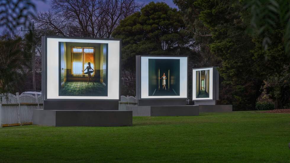 Three large light boxes installations exhibiting ballerina photos in Billilla gardens. 