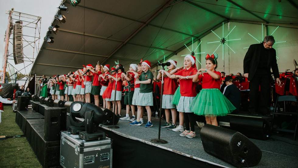 Hampton Primary school choir performing at Carols in Park in 2019.