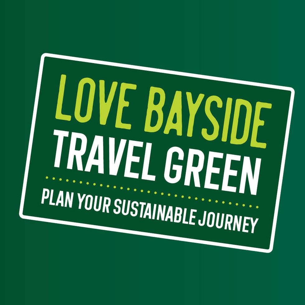 A green banner saying 'Love Bayside, travel green, plan your sustainable journey' with stick drawings on a bicycle, a pedestrian, a bus and a train.